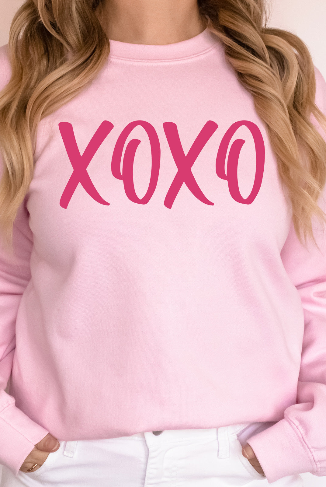 girl wearing pink sweatshirt