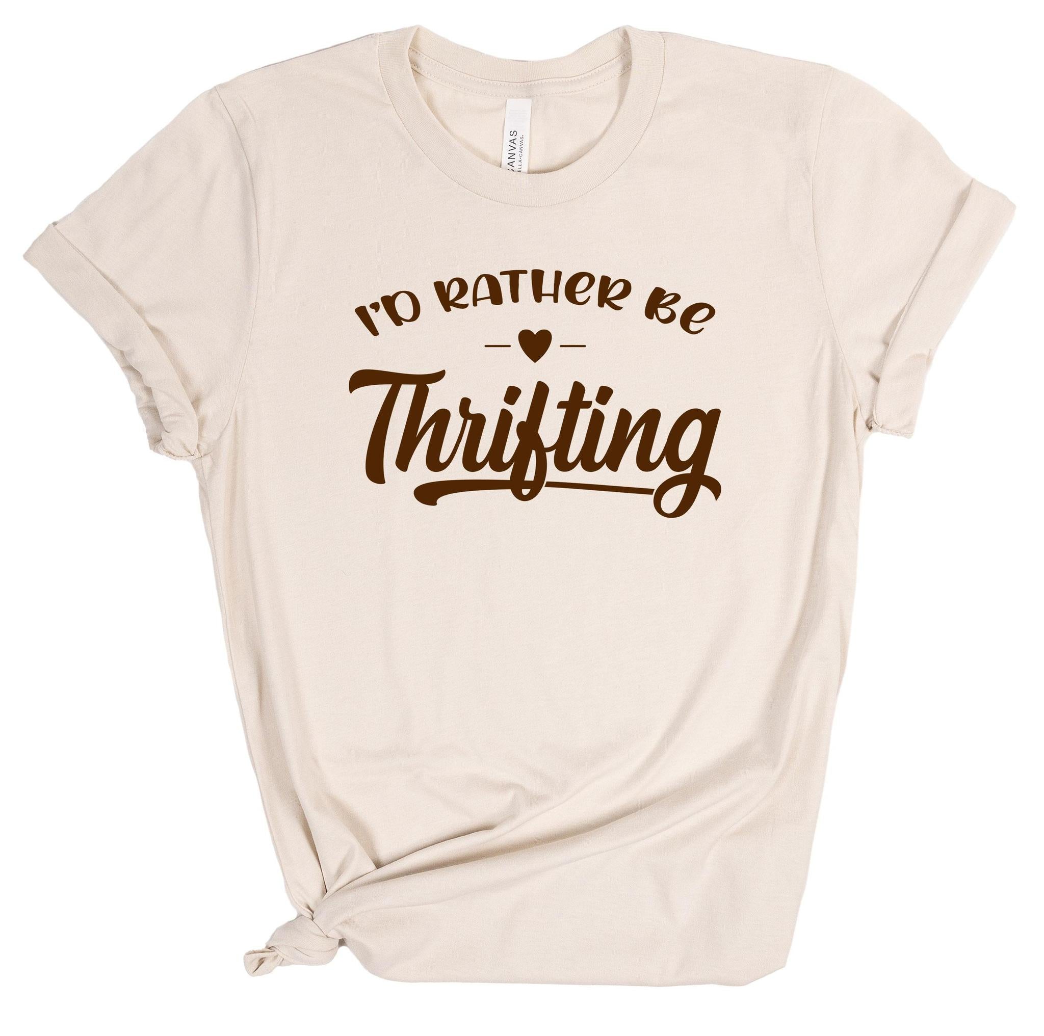 Beige t-shirt with 'I'd Rather Be Thrifting' text on a white background
