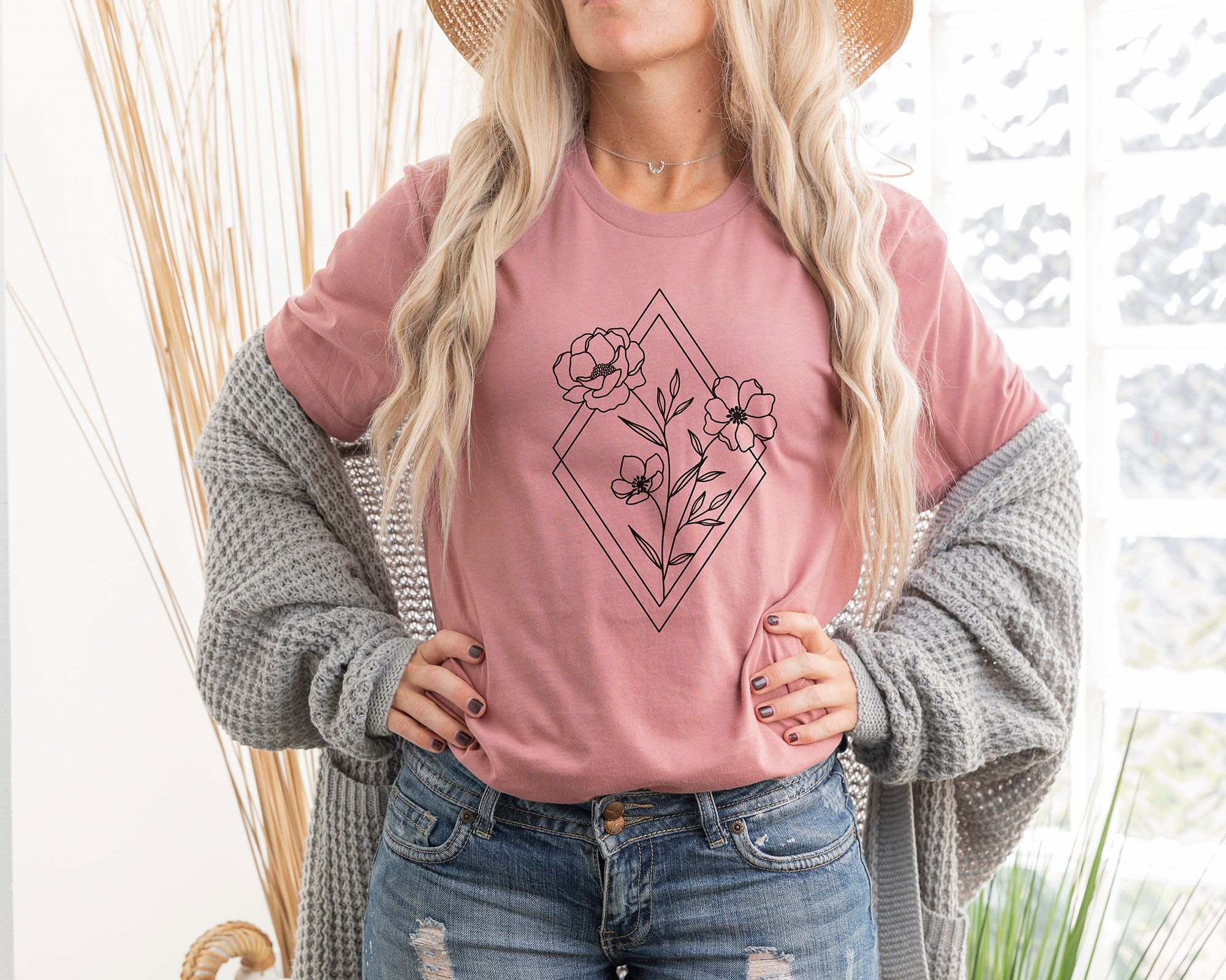 model wearing floral diamond shirt