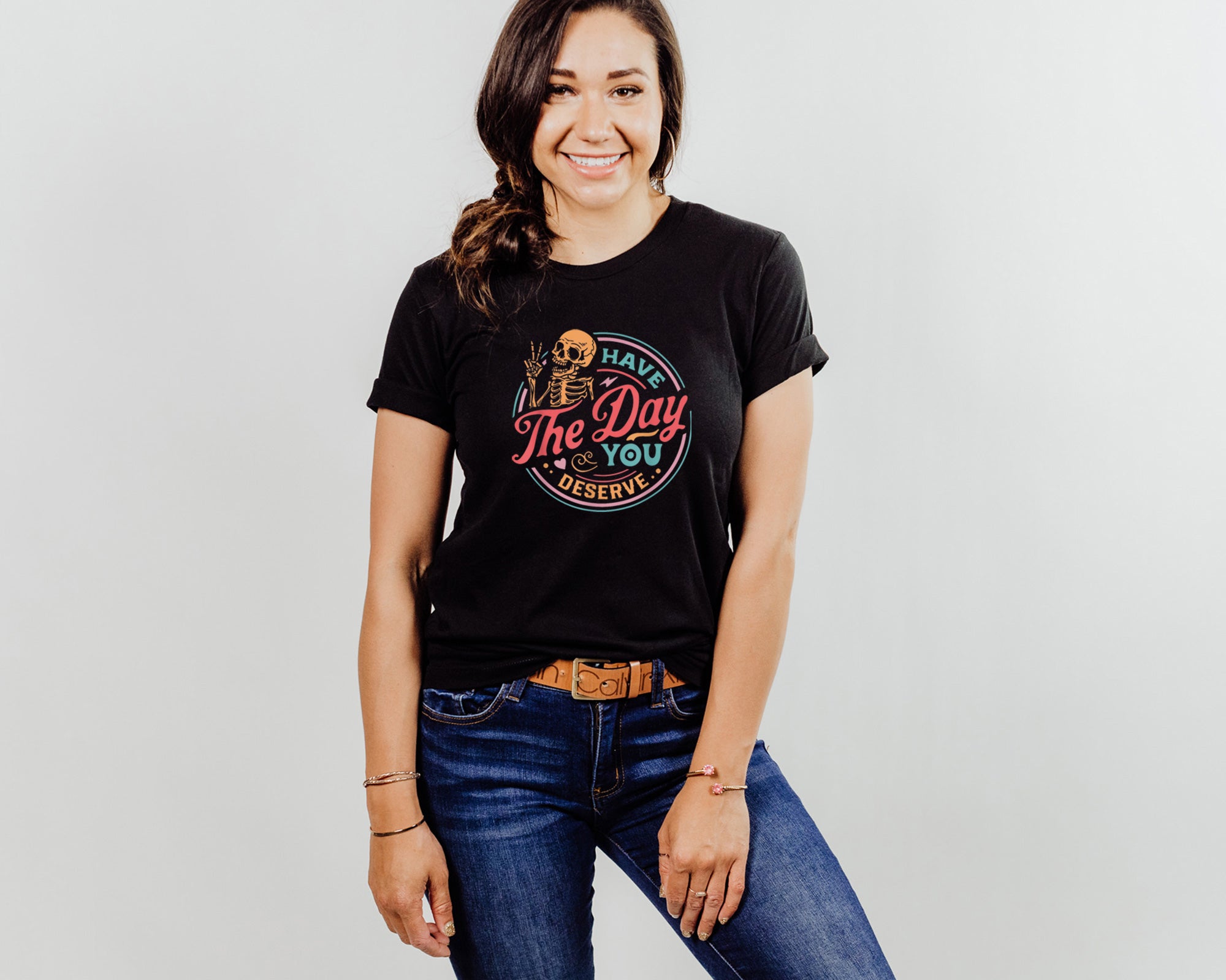 Day You Deserve shirt on black tee worn by female model