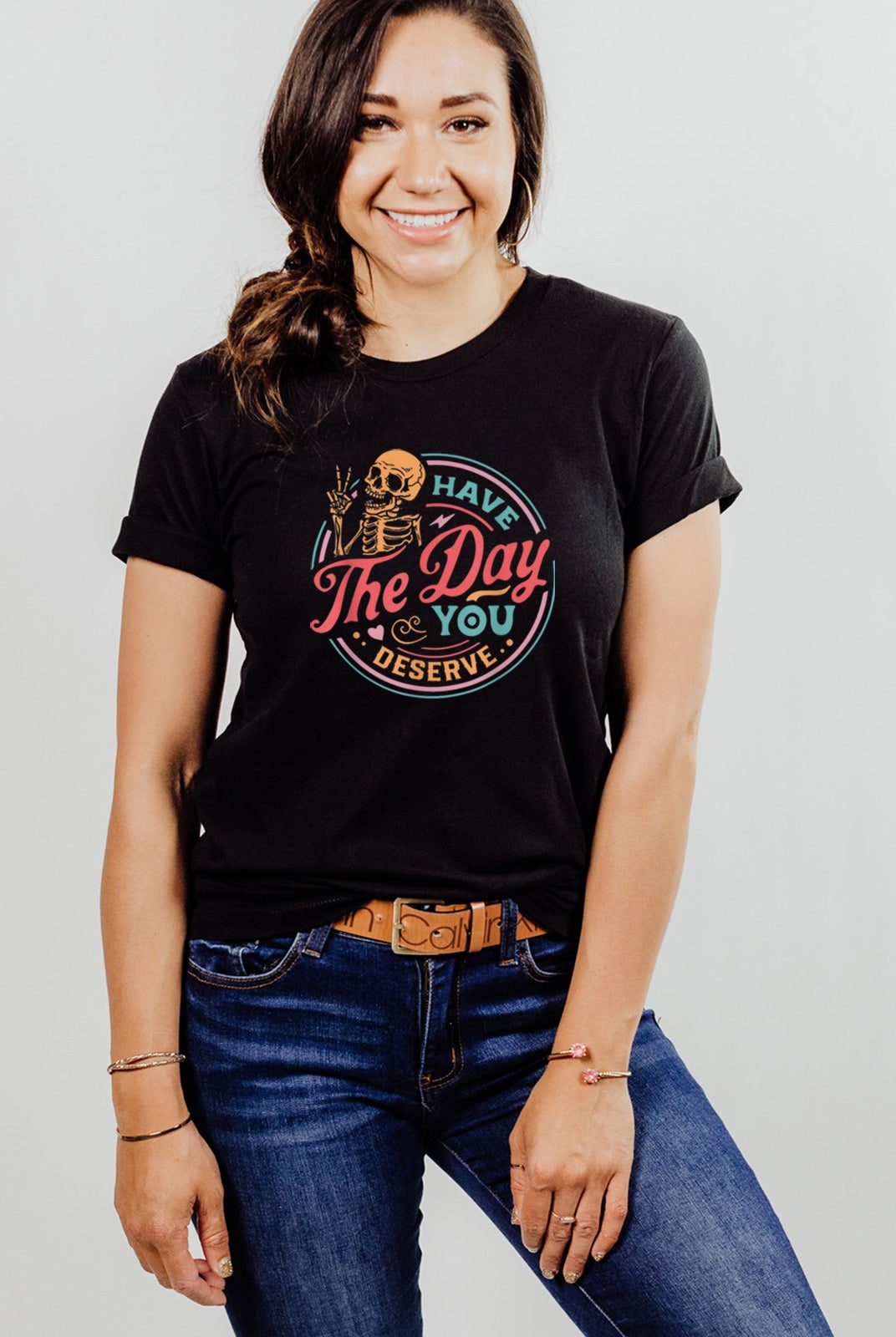 Day You Deserve shirt on black tee worn by female model