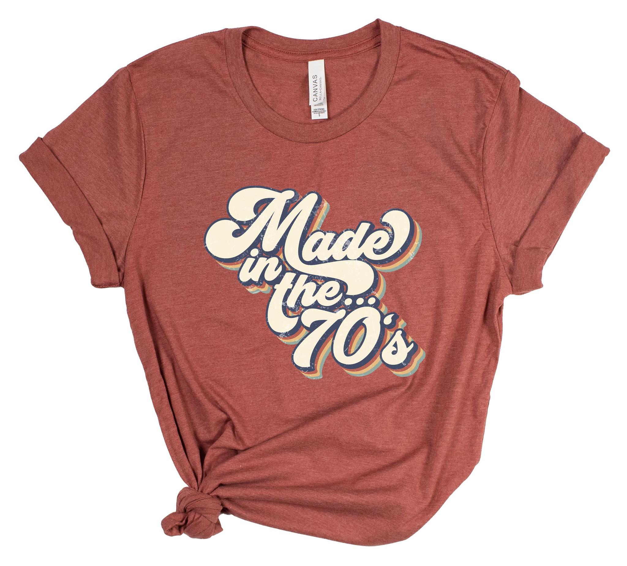 Red t-shirt with 'Made in the 70's' text on a white background
