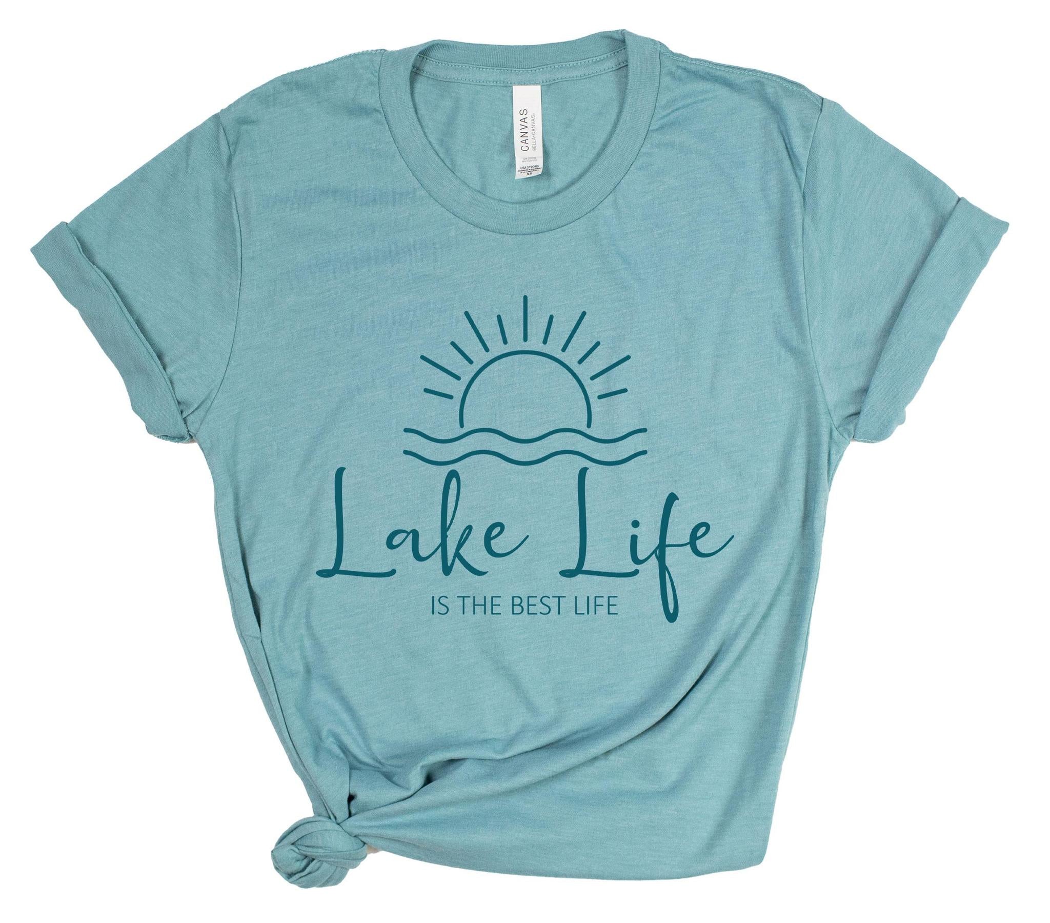 Light blue t-shirt with 'Lake Life is the Best Life' graphic on a white background